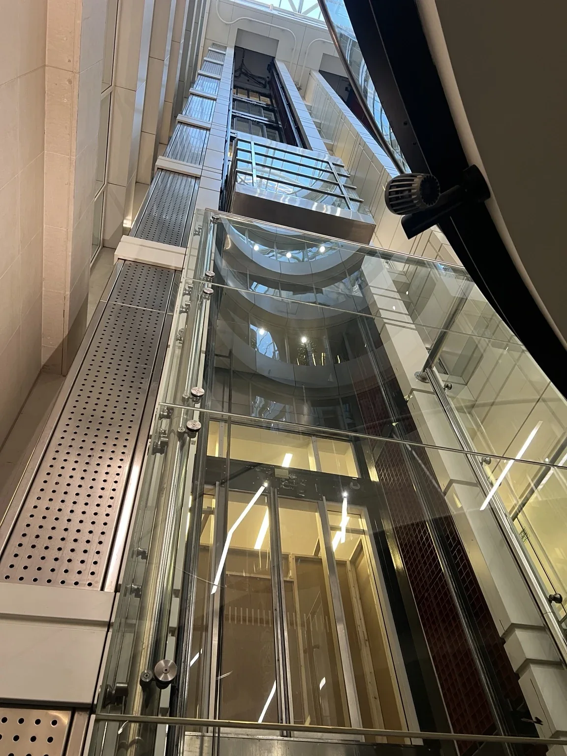 Glass passenger lift and lift shaft